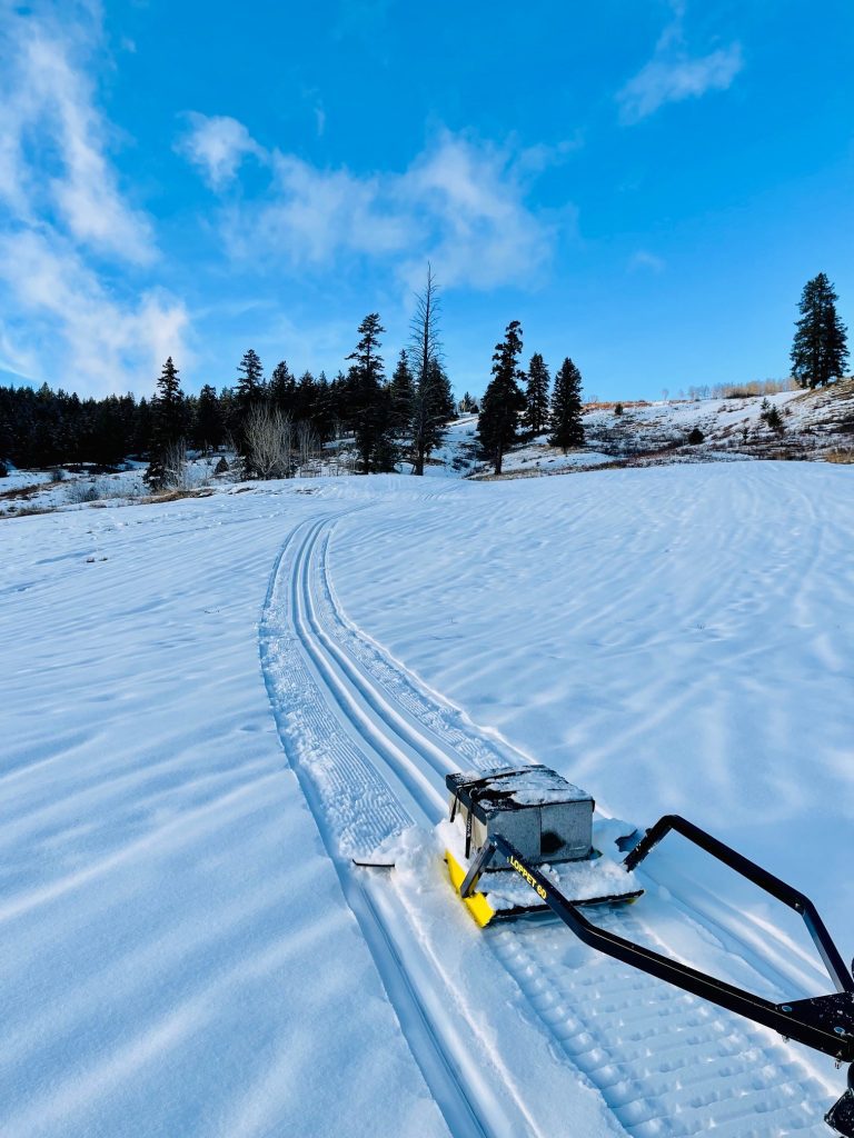 Pinantan Lake BC Canada snow hard crust snow still leaving a Classic path on.